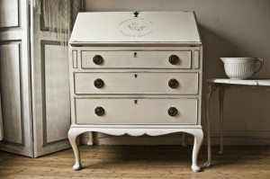Choose a bureau with pretty detailing and give it a make-over.